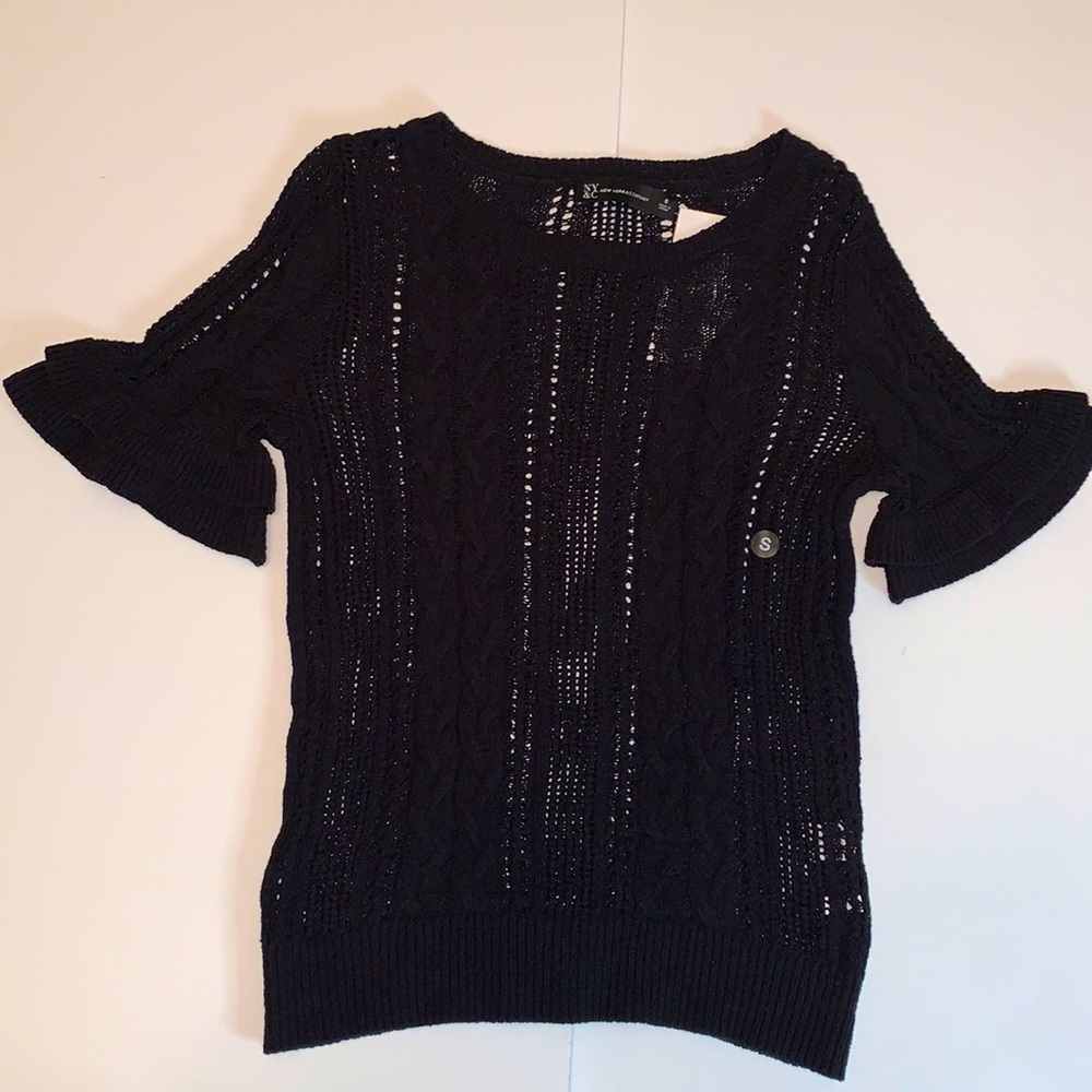 Dk Blue cable knit sweater with double ruffle short sleeve. 55% cotton 45% nylon